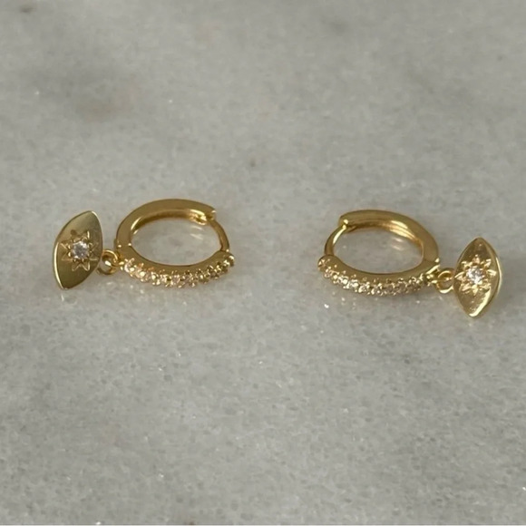 Gold Crystal Pave Evil Eye Star Burst Huggie Hoop Dangle Earrings
Brand New - Picture 3 of 6